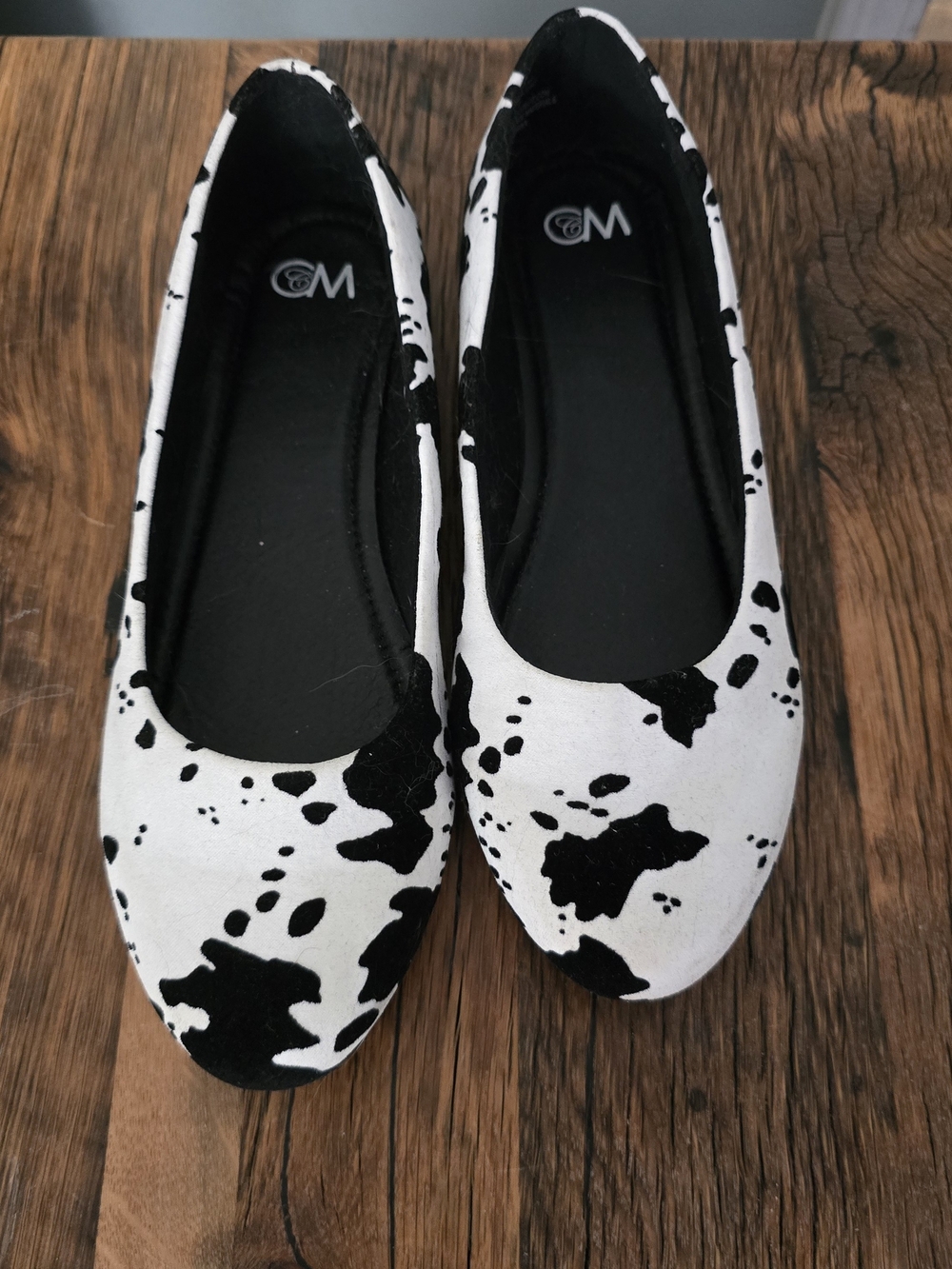 Black & White Cow-Print Ballet Flats - Women